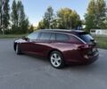 Красный Опель Инсигния, объемом двигателя 2 л и пробегом 218 тыс. км за 12350 $, фото 4 на Automoto.ua