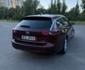 Червоний Опель Інсігнія, об'ємом двигуна 1.96 л та пробігом 273 тис. км за 12888 $, фото 3 на Automoto.ua