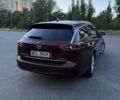 Красный Опель Инсигния, объемом двигателя 2 л и пробегом 218 тыс. км за 12350 $, фото 3 на Automoto.ua