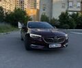 Красный Опель Инсигния, объемом двигателя 2 л и пробегом 273 тыс. км за 14494 $, фото 1 на Automoto.ua