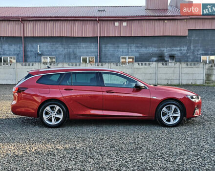 Красный Опель Инсигния, объемом двигателя 2 л и пробегом 164 тыс. км за 16999 $, фото 6 на Automoto.ua