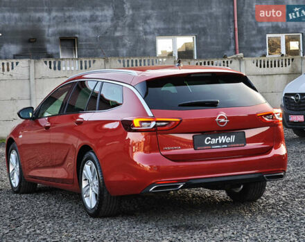 Красный Опель Инсигния, объемом двигателя 2 л и пробегом 164 тыс. км за 16999 $, фото 3 на Automoto.ua