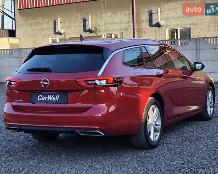 Красный Опель Инсигния, объемом двигателя 2 л и пробегом 165 тыс. км за 16999 $, фото 9 на Automoto.ua