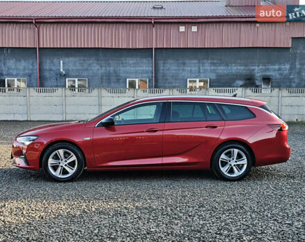 Красный Опель Инсигния, объемом двигателя 2 л и пробегом 164 тыс. км за 16999 $, фото 7 на Automoto.ua