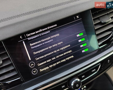 Красный Опель Инсигния, объемом двигателя 2 л и пробегом 165 тыс. км за 16999 $, фото 39 на Automoto.ua