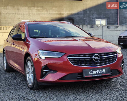 Красный Опель Инсигния, объемом двигателя 2 л и пробегом 165 тыс. км за 16999 $, фото 1 на Automoto.ua