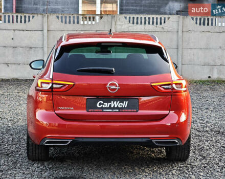 Красный Опель Инсигния, объемом двигателя 2 л и пробегом 164 тыс. км за 16999 $, фото 4 на Automoto.ua