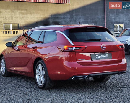 Красный Опель Инсигния, объемом двигателя 2 л и пробегом 165 тыс. км за 16999 $, фото 5 на Automoto.ua