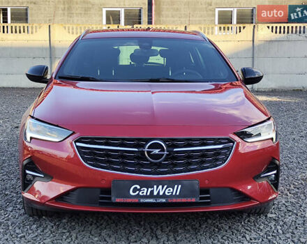 Красный Опель Инсигния, объемом двигателя 2 л и пробегом 165 тыс. км за 16999 $, фото 2 на Automoto.ua