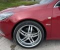 Красный Опель Инсигния, объемом двигателя 2 л и пробегом 240 тыс. км за 8300 $, фото 10 на Automoto.ua