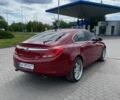 Червоний Опель Інсігнія, об'ємом двигуна 2 л та пробігом 240 тис. км за 8300 $, фото 5 на Automoto.ua