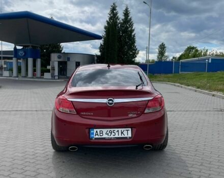 Червоний Опель Інсігнія, об'ємом двигуна 2 л та пробігом 240 тис. км за 8300 $, фото 4 на Automoto.ua
