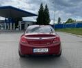 Червоний Опель Інсігнія, об'ємом двигуна 2 л та пробігом 240 тис. км за 8300 $, фото 4 на Automoto.ua