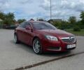 Красный Опель Инсигния, объемом двигателя 2 л и пробегом 240 тыс. км за 8300 $, фото 1 на Automoto.ua