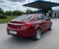Красный Опель Инсигния, объемом двигателя 2 л и пробегом 240 тыс. км за 8300 $, фото 6 на Automoto.ua
