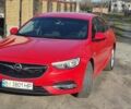 Красный Опель Инсигния, объемом двигателя 1.6 л и пробегом 130 тыс. км за 13999 $, фото 4 на Automoto.ua