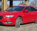Красный Опель Инсигния, объемом двигателя 1.6 л и пробегом 130 тыс. км за 13999 $, фото 1 на Automoto.ua