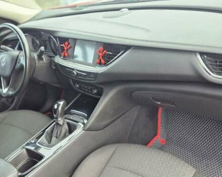 Красный Опель Инсигния, объемом двигателя 1.6 л и пробегом 130 тыс. км за 13999 $, фото 21 на Automoto.ua