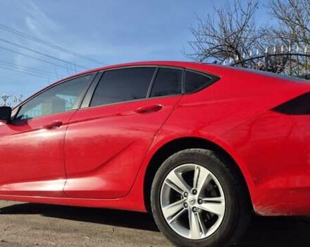 Красный Опель Инсигния, объемом двигателя 1.6 л и пробегом 130 тыс. км за 13999 $, фото 2 на Automoto.ua