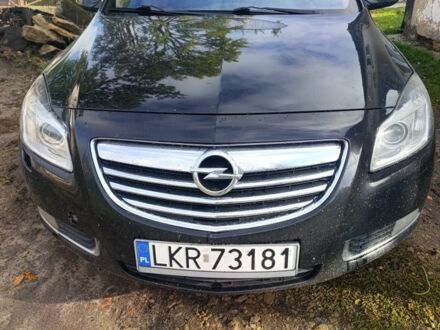 Красный Опель Инсигния, объемом двигателя 2 л и пробегом 312 тыс. км за 3700 $, фото 1 на Automoto.ua