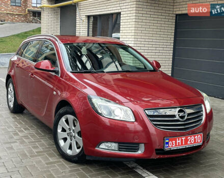 Червоний Опель Інсігнія, об'ємом двигуна 2 л та пробігом 210 тис. км за 6750 $, фото 1 на Automoto.ua