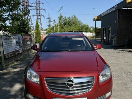 Червоний Опель Інсігнія, об'ємом двигуна 2 л та пробігом 230 тис. км за 7500 $, фото 1 на Automoto.ua