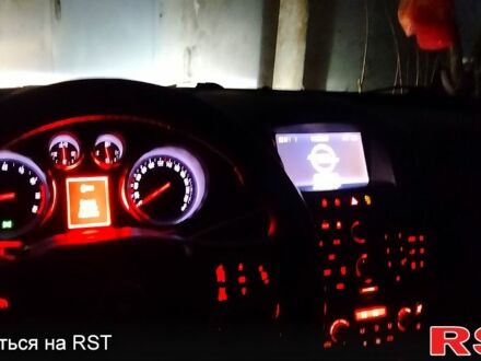 Червоний Опель Інсігнія, об'ємом двигуна 2 л та пробігом 25100 тис. км за 7500 $, фото 1 на Automoto.ua