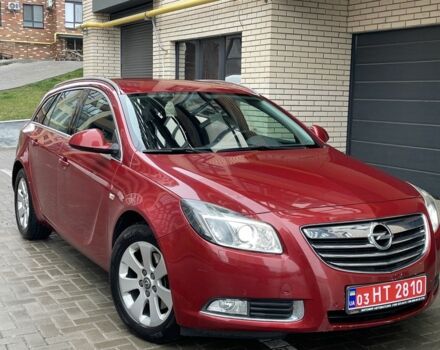 Червоний Опель Інсігнія, об'ємом двигуна 2 л та пробігом 210 тис. км за 6750 $, фото 1 на Automoto.ua