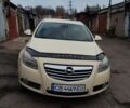 Желтый Опель Инсигния, объемом двигателя 1.96 л и пробегом 253 тыс. км за 7800 $, фото 1 на Automoto.ua