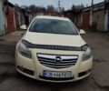 Желтый Опель Инсигния, объемом двигателя 1.96 л и пробегом 253 тыс. км за 7800 $, фото 1 на Automoto.ua