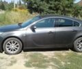 Сірий Опель Інсігнія, об'ємом двигуна 2 л та пробігом 220 тис. км за 8900 $, фото 2 на Automoto.ua