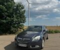 Серый Опель Инсигния, объемом двигателя 2 л и пробегом 296 тыс. км за 6250 $, фото 1 на Automoto.ua