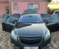 Сірий Опель Інсігнія, об'ємом двигуна 2 л та пробігом 274 тис. км за 9300 $, фото 3 на Automoto.ua