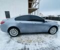 Серый Опель Инсигния, объемом двигателя 2 л и пробегом 250 тыс. км за 7350 $, фото 4 на Automoto.ua