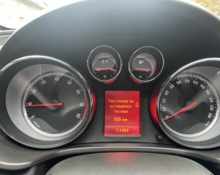 Серый Опель Инсигния, объемом двигателя 1.8 л и пробегом 174 тыс. км за 6499 $, фото 4 на Automoto.ua