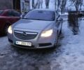 Серый Опель Инсигния, объемом двигателя 2 л и пробегом 233 тыс. км за 7450 $, фото 1 на Automoto.ua
