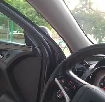 Серый Опель Инсигния, объемом двигателя 2 л и пробегом 221 тыс. км за 7700 $, фото 14 на Automoto.ua