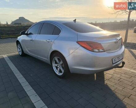 Серый Опель Инсигния, объемом двигателя 1.96 л и пробегом 350 тыс. км за 6300 $, фото 2 на Automoto.ua