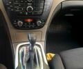 Серый Опель Инсигния, объемом двигателя 2 л и пробегом 305 тыс. км за 7500 $, фото 4 на Automoto.ua