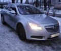 Сірий Опель Інсігнія, об'ємом двигуна 2 л та пробігом 233 тис. км за 7450 $, фото 1 на Automoto.ua