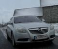 Серый Опель Инсигния, объемом двигателя 1.96 л и пробегом 277 тыс. км за 6500 $, фото 2 на Automoto.ua