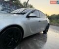 Сірий Опель Інсігнія, об'ємом двигуна 2 л та пробігом 235 тис. км за 6499 $, фото 1 на Automoto.ua