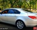 Серый Опель Инсигния, объемом двигателя 2 л и пробегом 305 тыс. км за 7500 $, фото 1 на Automoto.ua