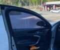 Сірий Опель Інсігнія, об'ємом двигуна 2 л та пробігом 235 тис. км за 6499 $, фото 4 на Automoto.ua