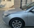 Серый Опель Инсигния, объемом двигателя 1.8 л и пробегом 181 тыс. км за 8000 $, фото 4 на Automoto.ua