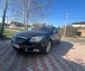 Серый Опель Инсигния, объемом двигателя 1.96 л и пробегом 260 тыс. км за 7700 $, фото 1 на Automoto.ua