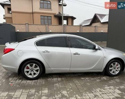 Серый Опель Инсигния, объемом двигателя 1.96 л и пробегом 277 тыс. км за 6500 $, фото 5 на Automoto.ua