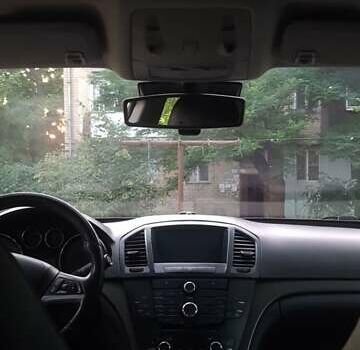 Серый Опель Инсигния, объемом двигателя 2 л и пробегом 221 тыс. км за 7700 $, фото 5 на Automoto.ua