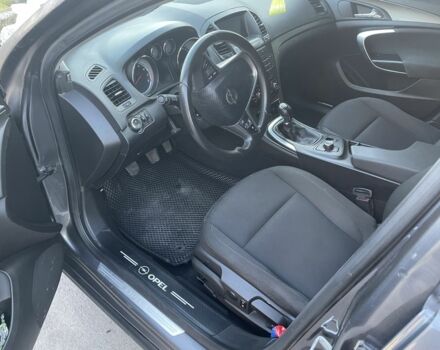 Серый Опель Инсигния, объемом двигателя 1.8 л и пробегом 174 тыс. км за 6499 $, фото 7 на Automoto.ua