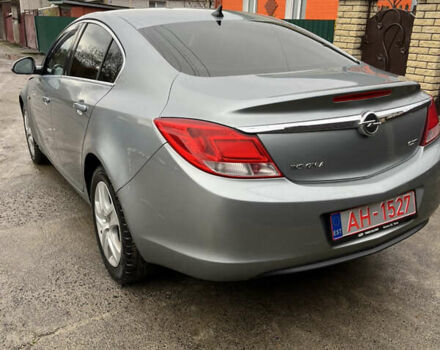 Серый Опель Инсигния, объемом двигателя 2 л и пробегом 260 тыс. км за 5500 $, фото 2 на Automoto.ua
